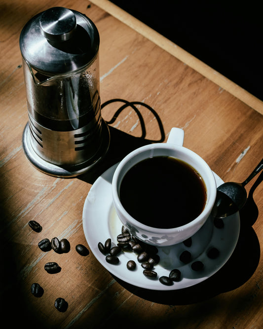 French press coffee maker, coffee mug