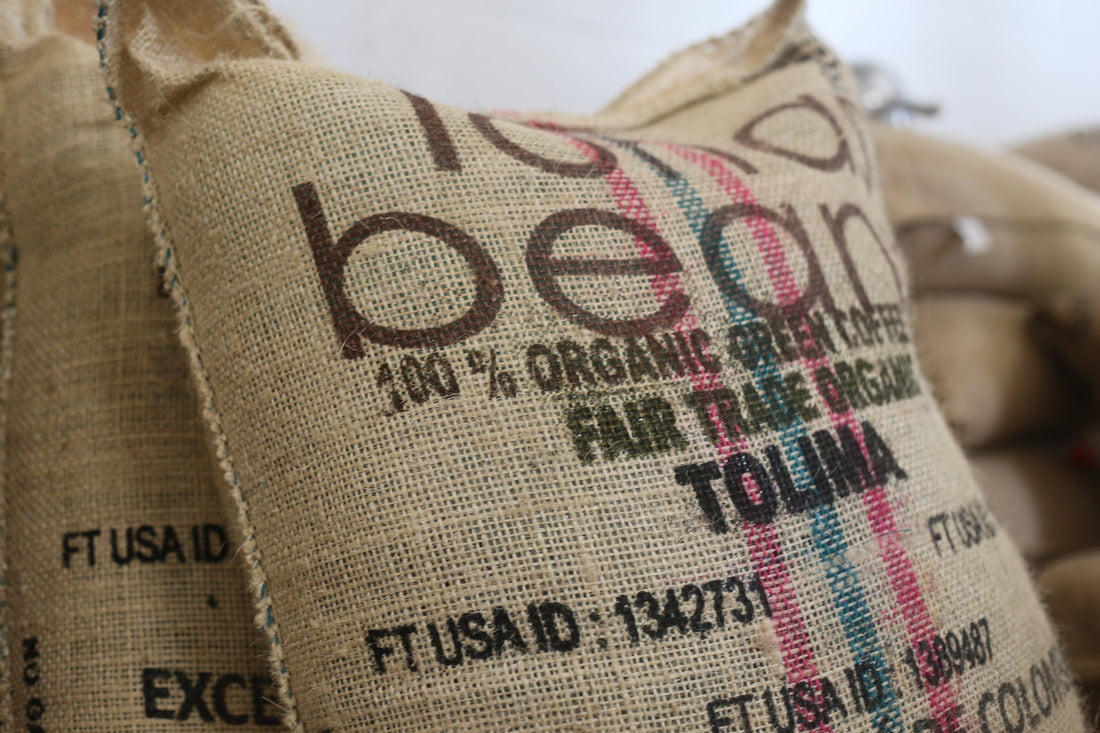 Green coffee beans in bag